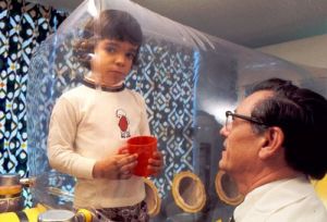 The bubble boy.  Born in 1971 with SCID, David Vetter lived in a sterile bubble to avoid outside germs that could kill him. He died in 1984 at 12 due to complications from a bone marrow transplant. [Credit: Baylor College of Medicine Archives]