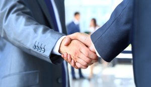 Two businessman shaking hands