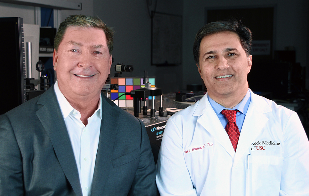 On the left is the late David Hinton, MD, and on the right is Mark Humayun, MD, PhD.